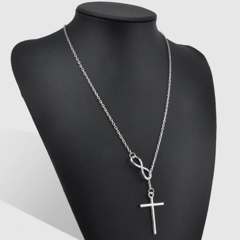 HP 10/4 Silver tone cross/infinity necklace.  20 inches
